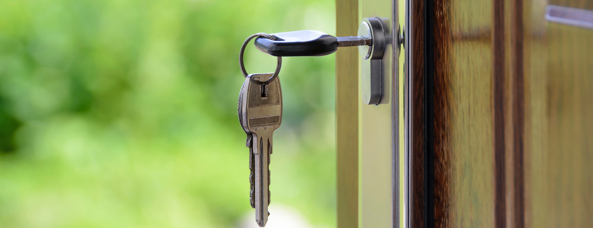 key in the lock of a front door